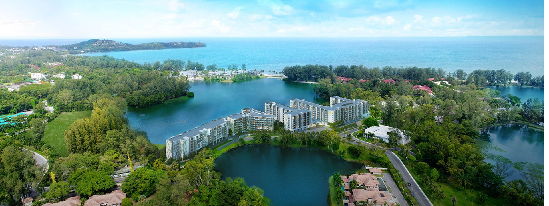 Aerial view of Laguna Phuket showing lakes, resorts and coastal landscape.