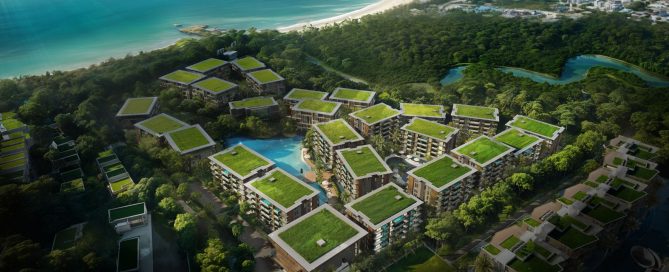 Aerial view of Patong Bay with modern resorts, residential complexes and coastal skyline, reflecting the impact of new launches like Ascott Abov Patong on Phuket’s resort residence market