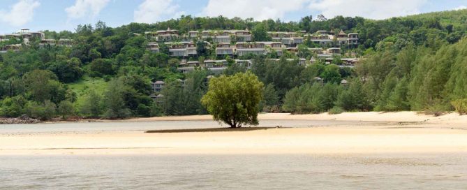 Aerial view of Layan Beach with low-density hillside residential developments in north-west Phuket