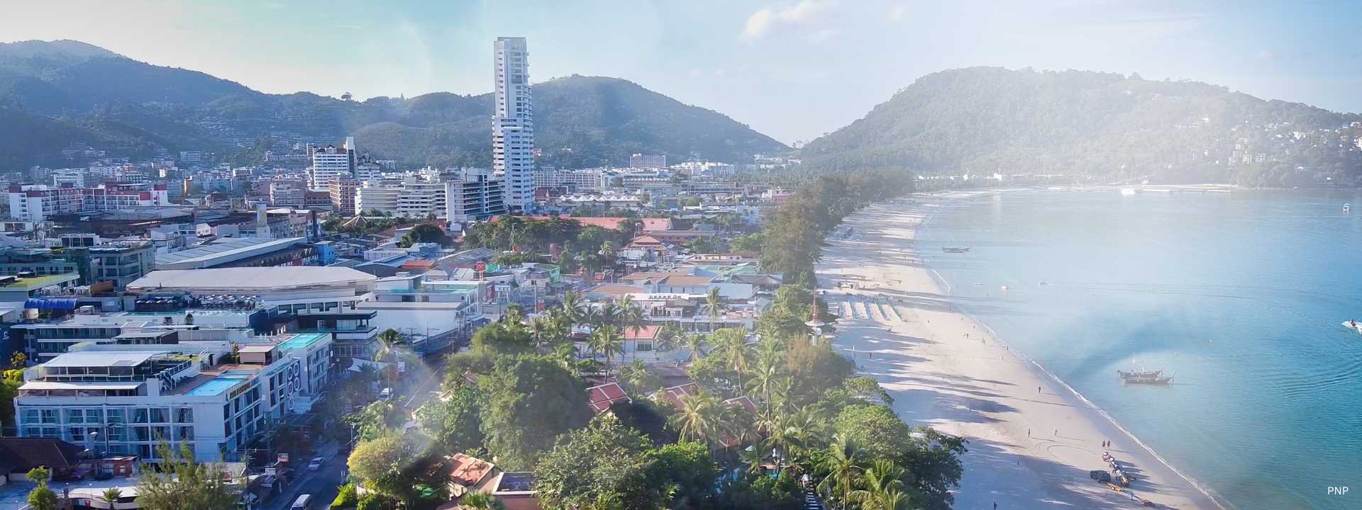 Aerial view of Patong Beach and surrounding urban development on Phuket’s west coast