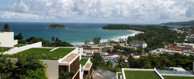 Elevated hillside residential development overlooking a coastal bay in Phuket