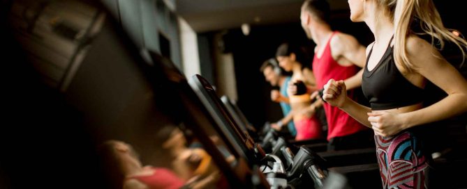 Group fitness class in a Phuket gym highlighting community-focused wellness lifestyle