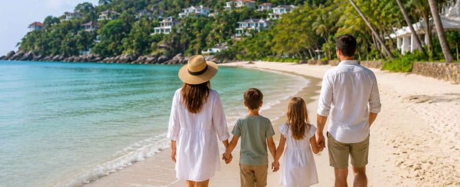 Family walking along a peaceful beach in Phuket, illustrating why more families are choosing Phuket for long-term living.